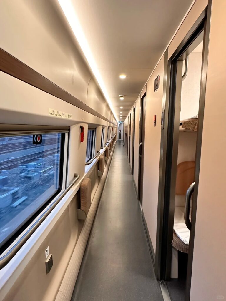 Corridor of G900 sleeper train carriage on Hong Kong to Shanghai route